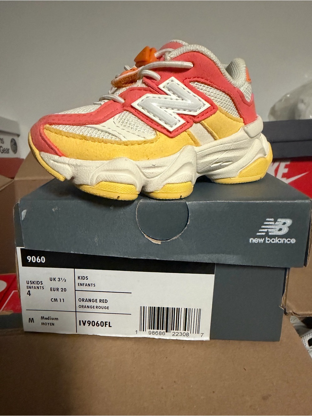 New Balance Kids Coral and Yellow Athletic Sneaker